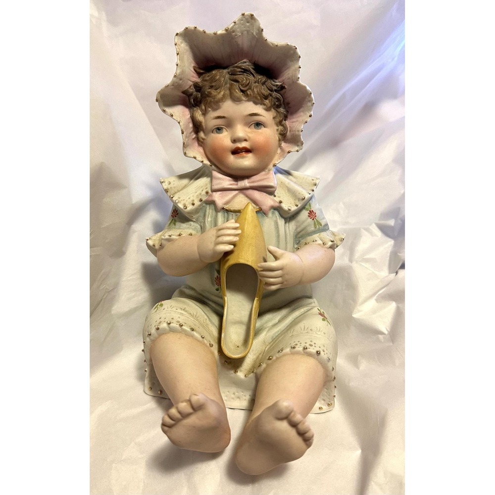 Antique German Bisque Piano Baby in Bonnet Holding Slipper Shoe 8"